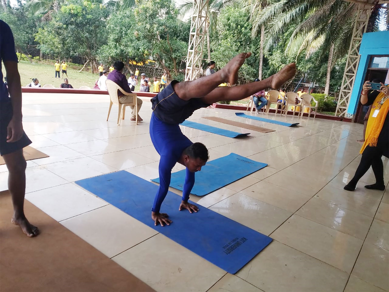 Students doing yoga at the School of Sports and Yogic Sciences